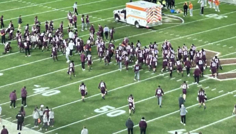 Players From Both Teams Take A kneel As Virginia Tech Player Is Escorted On An Ambulance After Devastating Injury